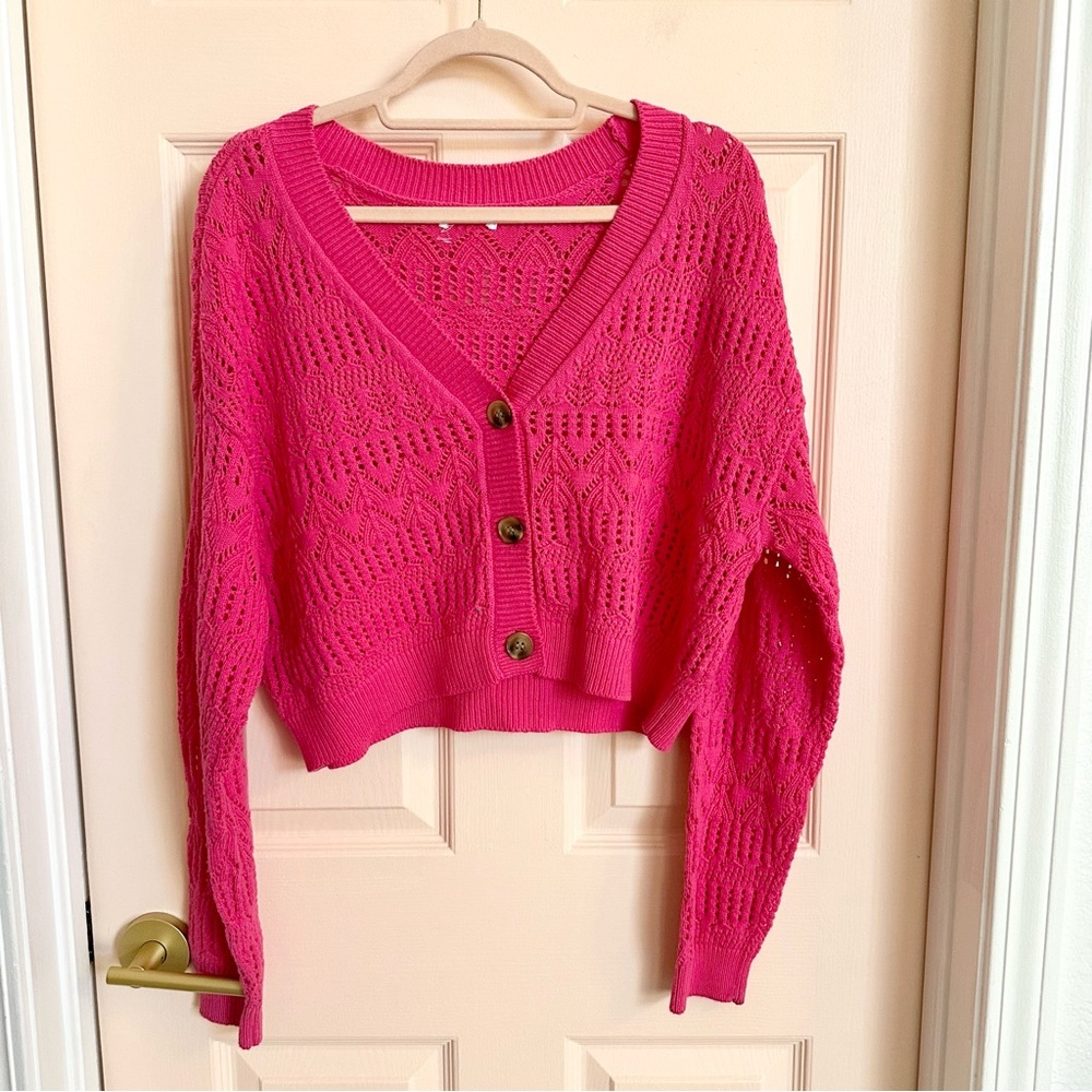 Bright pink knitted sweater